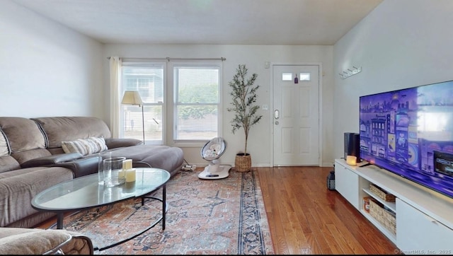 279 New Haven Ave Apt E, Milford, CT 06460 - living area featuring wood finished floors