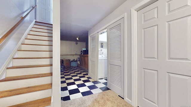 279 New Haven Ave Apt E, Milford, CT 06460 - stairway featuring tile patterned floors