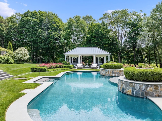 474 Ponus Rdg, New Canaan, CT 06840 - swimming pool featuring a yard, view of wooded area, and a storage structure
