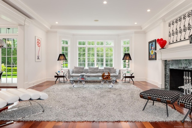 474 Ponus Rdg, New Canaan, CT 06840 - living area with crown molding, wood finished floors, a fireplace, and recessed lighting