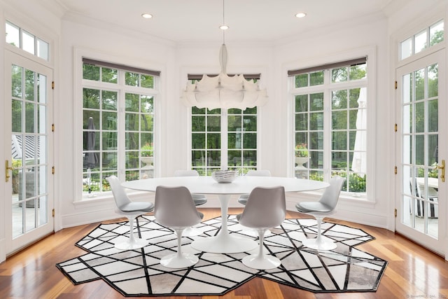 474 Ponus Rdg, New Canaan, CT 06840 - sunroom / solarium with french doors, plenty of natural light, crown molding, a chandelier, and wood finished floors