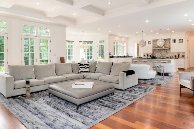 474 Ponus Rdg, New Canaan, CT 06840 - living room with ornamental molding, beam ceiling, light wood-style flooring, recessed lighting, and coffered ceiling
