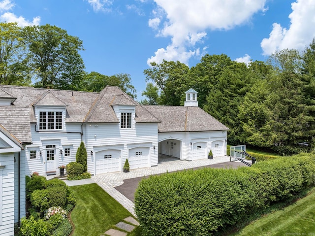 474 Ponus Rdg, New Canaan, CT 06840 - view of front facade with a garage