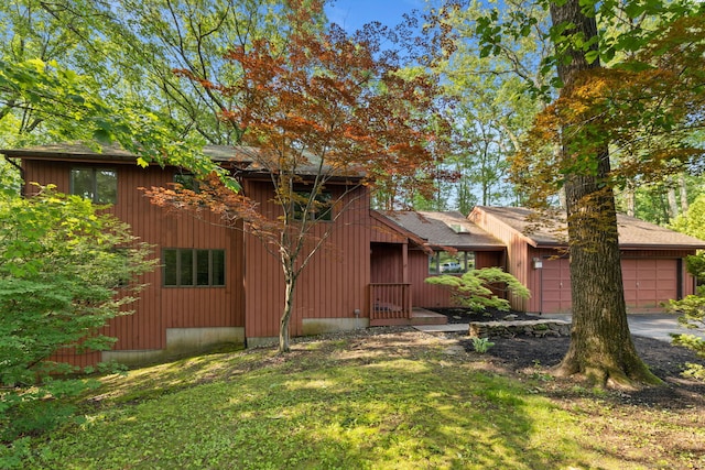 24 Quince Ct, Bristol, CT 06010 - view of front of home featuring an attached garage, a front yard, and driveway