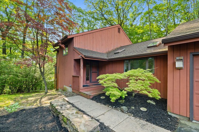 24 Quince Ct, Bristol, CT 06010 - doorway to property featuring a shingled roof