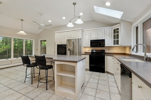 24 Quince Ct, Bristol, CT 06010 - kitchen featuring black appliances, lofted ceiling, open shelves, light tile patterned flooring, and white cabinetry