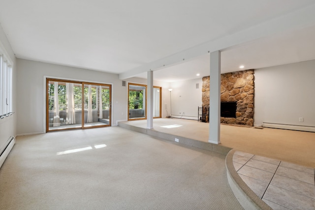 24 Quince Ct, Bristol, CT 06010 - unfurnished living room with baseboard heating, carpet floors, a stone fireplace, a baseboard radiator, and recessed lighting