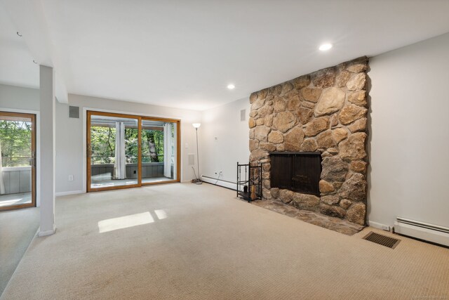 24 Quince Ct, Bristol, CT 06010 - unfurnished living room with light carpet, healthy amount of natural light, a stone fireplace, and recessed lighting
