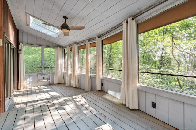 24 Quince Ct, Bristol, CT 06010 - unfurnished sunroom with a skylight, a ceiling fan, vaulted ceiling, and plenty of natural light