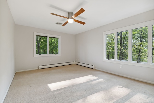 24 Quince Ct, Bristol, CT 06010 - empty room with healthy amount of natural light, carpet floors, ceiling fan, and a baseboard heating unit