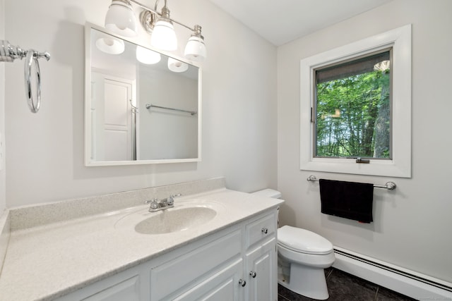 24 Quince Ct, Bristol, CT 06010 - bathroom with a baseboard heating unit, vanity, and tile patterned floors