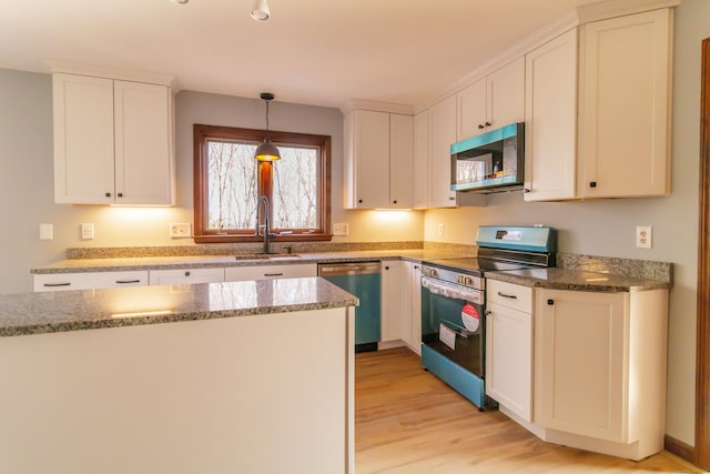 155 Melinda Ln, Bristol, CT 06010 - kitchen with appliances with stainless steel finishes, light wood-style flooring, white cabinets, pendant lighting, and light stone counters