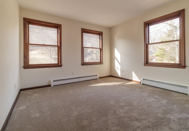 155 Melinda Ln, Bristol, CT 06010 - spare room featuring a baseboard radiator, carpet flooring, and plenty of natural light