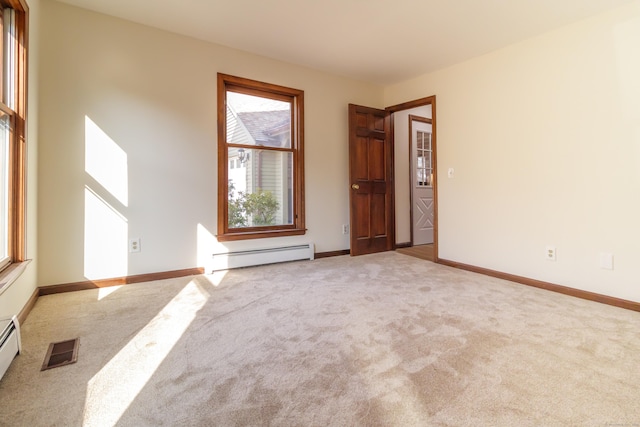 155 Melinda Ln, Bristol, CT 06010 - carpeted empty room featuring a baseboard heating unit