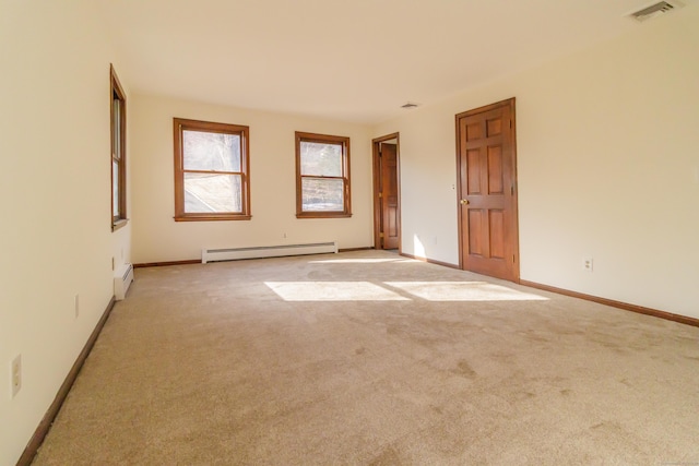 155 Melinda Ln, Bristol, CT 06010 - empty room featuring a baseboard radiator and light colored carpet