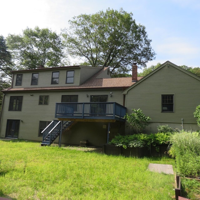 155 Melinda Ln, Bristol, CT 06010 - rear view of house featuring a wooden deck, stairs, a chimney, and a lawn