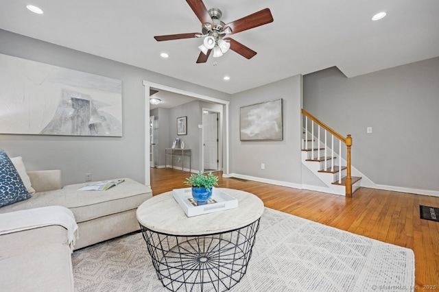 65 Bennett St, Fairfield, CT 06825 - living room with ceiling fan, wood finished floors, stairway, and recessed lighting