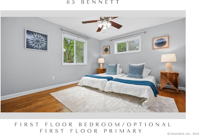 65 Bennett St, Fairfield, CT 06825 - bedroom featuring multiple windows and wood finished floors