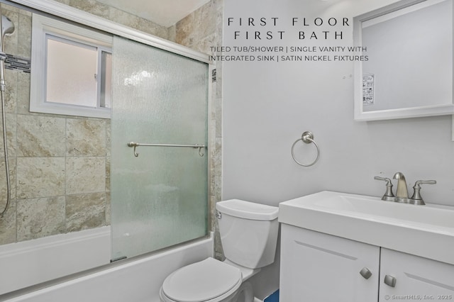 65 Bennett St, Fairfield, CT 06825 - bathroom featuring vanity and combined bath / shower with glass door