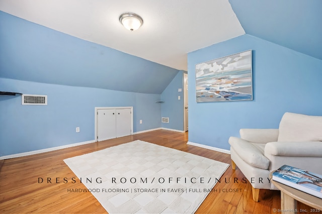 65 Bennett St, Fairfield, CT 06825 - living area with vaulted ceiling and wood finished floors
