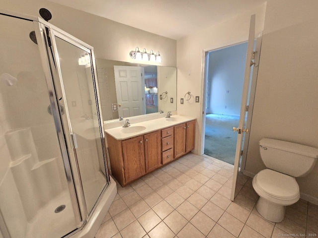 244 Oakland St Apt F, Manchester, CT 06042 - full bathroom featuring tile patterned flooring, a stall shower, and double vanity