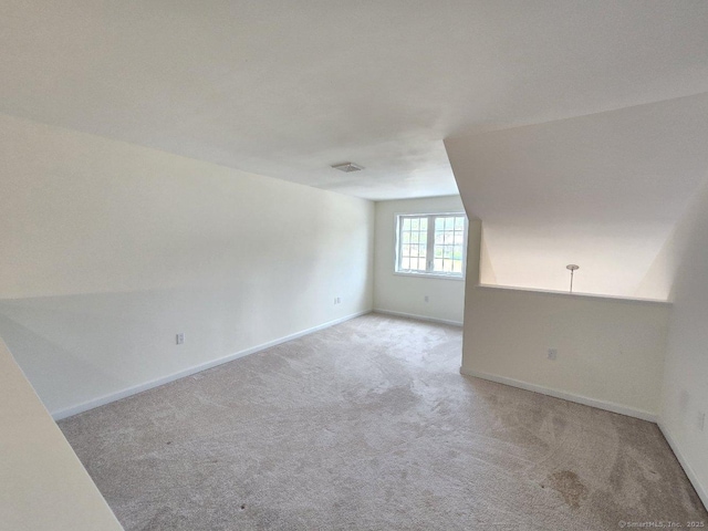 244 Oakland St Apt F, Manchester, CT 06042 - unfurnished room featuring carpet flooring and baseboards
