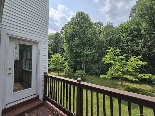 244 Oakland St Apt F, Manchester, CT 06042 - wooden deck featuring a lawn