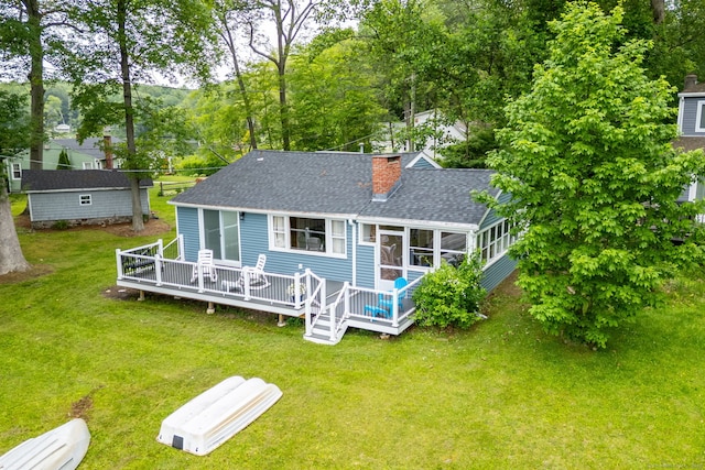 5 Lake Pt, Haddam, CT 06441 - rear view of property featuring a sunroom, a shingled roof, a chimney, and a wooden deck
