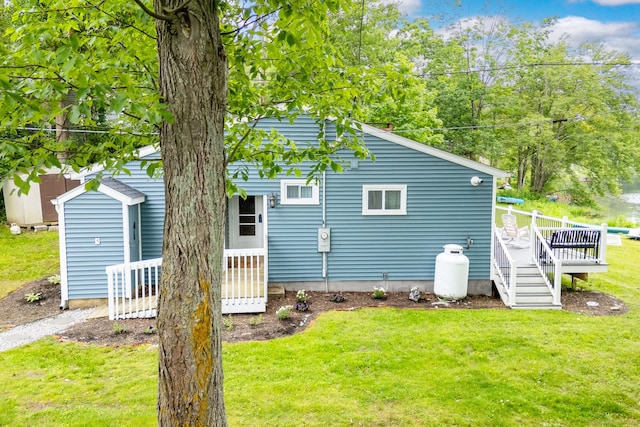 5 Lake Pt, Haddam, CT 06441 - view of side of property with a yard and a wooden deck