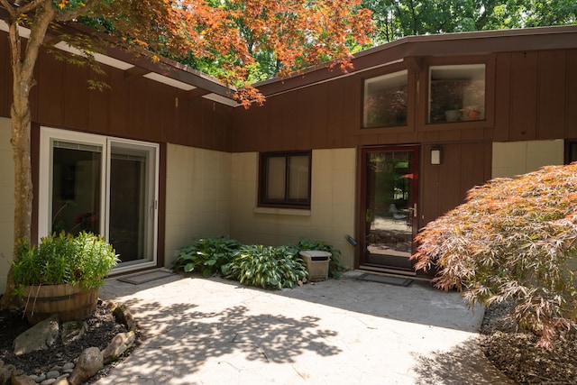 120 Highwoods Dr, Guilford, CT 06437 - doorway to property featuring a patio area