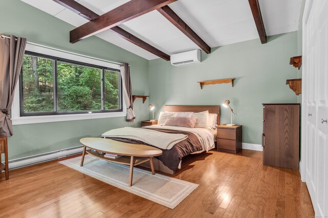 120 Highwoods Dr, Guilford, CT 06437 - bedroom with a baseboard heating unit, beam ceiling, wood-type flooring, and an AC wall unit
