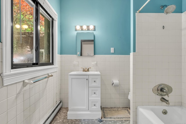 120 Highwoods Dr, Guilford, CT 06437 - bathroom featuring tile walls, tile patterned floors, vanity, wainscoting, and shower / washtub combination