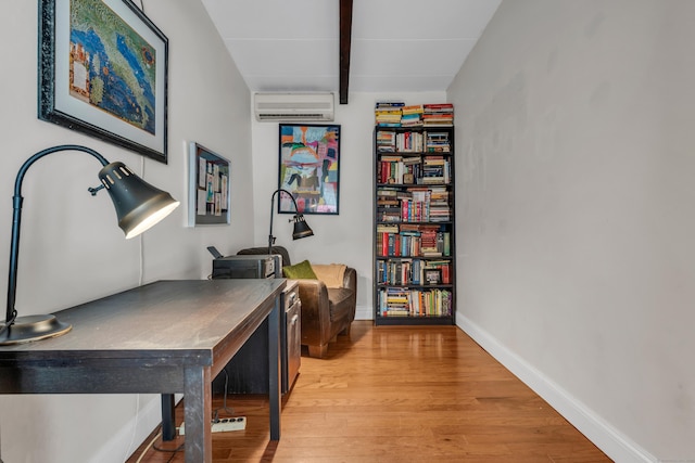 120 Highwoods Dr, Guilford, CT 06437 - home office featuring an AC wall unit and light wood finished floors