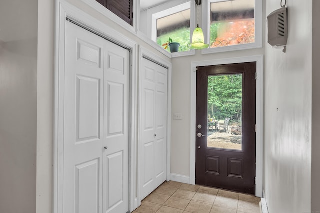 120 Highwoods Dr, Guilford, CT 06437 - foyer with light tile patterned floors and baseboards