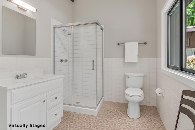 120 Highwoods Dr, Guilford, CT 06437 - full bath featuring tile walls, a wainscoted wall, a stall shower, and vanity