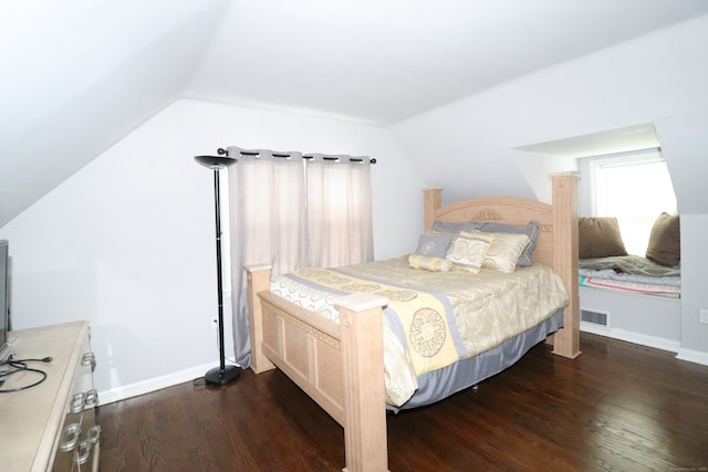 80 Longbranch Ave, Stratford, CT 06615 - bedroom with lofted ceiling and dark wood-style flooring
