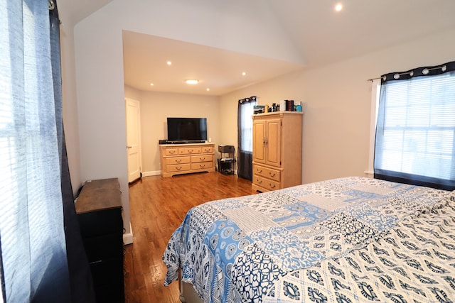 80 Longbranch Ave, Stratford, CT 06615 - bedroom with vaulted ceiling, multiple windows, wood finished floors, and recessed lighting