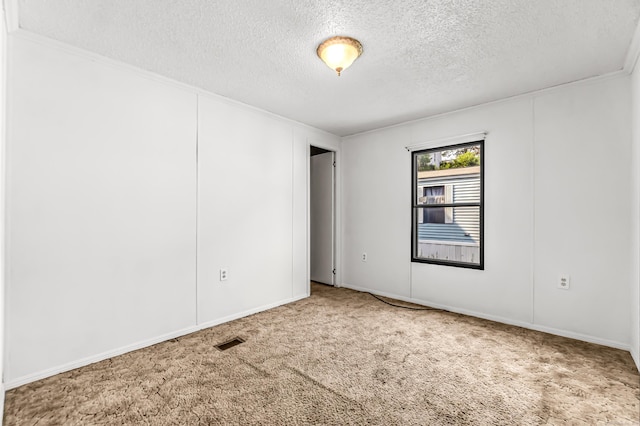 105 Woodland Park, Shelton, CT 06484 - carpeted empty room featuring a textured ceiling and ornamental molding