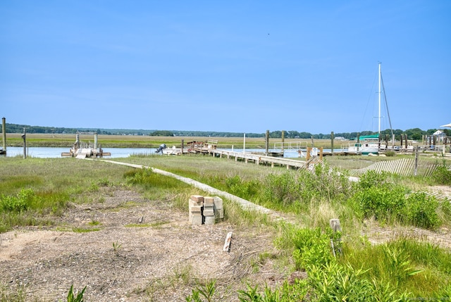 57 Circle Beach Rd, Madison, CT 06443 - view of yard with a water view and a boat dock