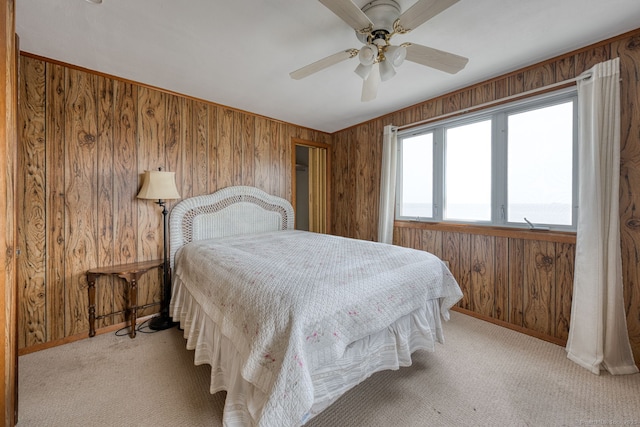 57 Circle Beach Rd, Madison, CT 06443 - bedroom with wooden walls, carpet floors, and a ceiling fan