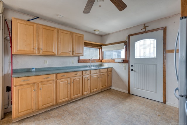 57 Circle Beach Rd, Madison, CT 06443 - kitchen with healthy amount of natural light, a ceiling fan, freestanding refrigerator, and fridge