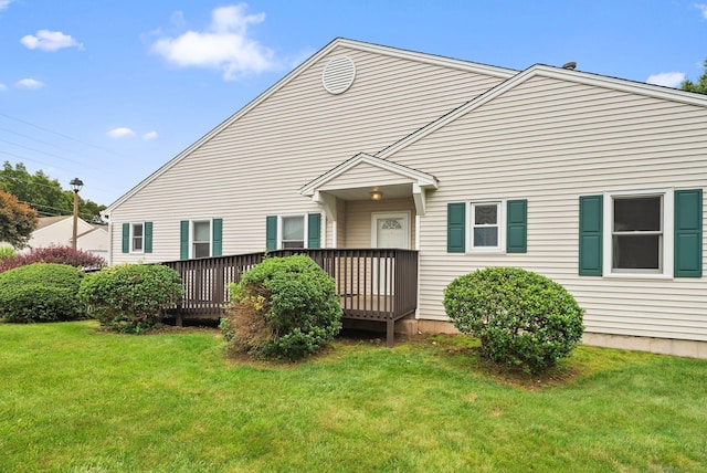 671 Ledgeview Ct Unit 671, Southington, CT 06489 - rear view of house featuring a deck and a yard