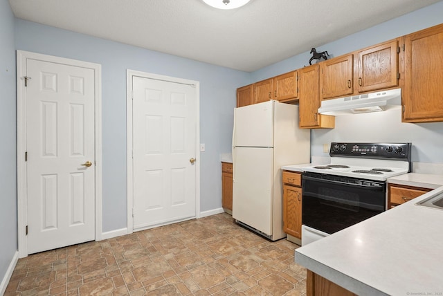 671 Ledgeview Ct Unit 671, Southington, CT 06489 - kitchen with under cabinet range hood, electric range, freestanding refrigerator, light countertops, and stone finish floors