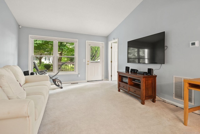 671 Ledgeview Ct Unit 671, Southington, CT 06489 - living room featuring light colored carpet and vaulted ceiling