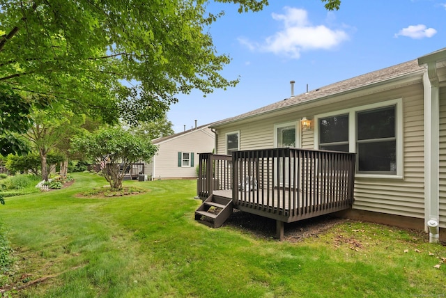 671 Ledgeview Ct Unit 671, Southington, CT 06489 - rear view of property featuring a wooden deck and a yard