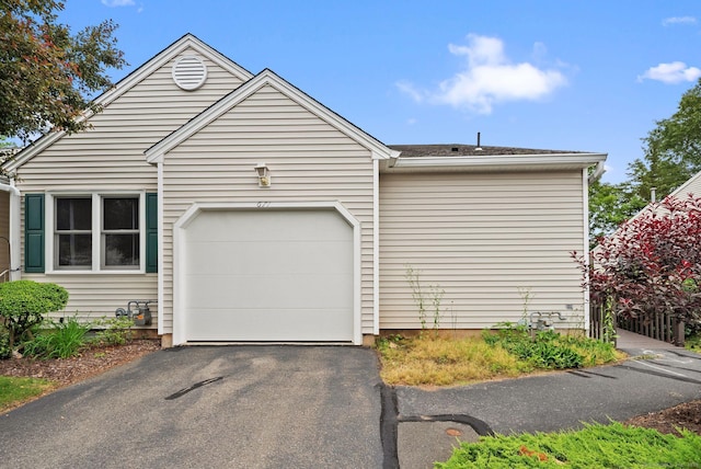 671 Ledgeview Ct Unit 671, Southington, CT 06489 - view of front of home with an attached garage and asphalt driveway