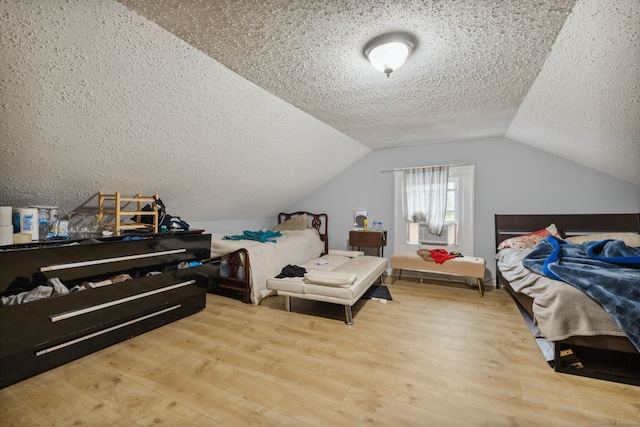 83 James St, New Haven, CT 06513 - bedroom featuring wood finished floors, a textured ceiling, and vaulted ceiling