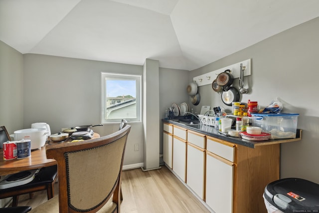 83 James St, New Haven, CT 06513 - bar area with light wood-style flooring and lofted ceiling