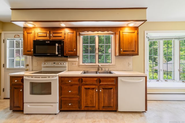 765 Kettletown Rd, Southbury, CT 06488 - kitchen with white appliances, light countertops, and brown cabinets