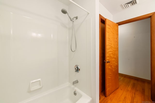 765 Kettletown Rd, Southbury, CT 06488 - bathroom with bathtub / shower combination and wood finished floors